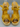 Offene Sandalen mit gelbem Absatz